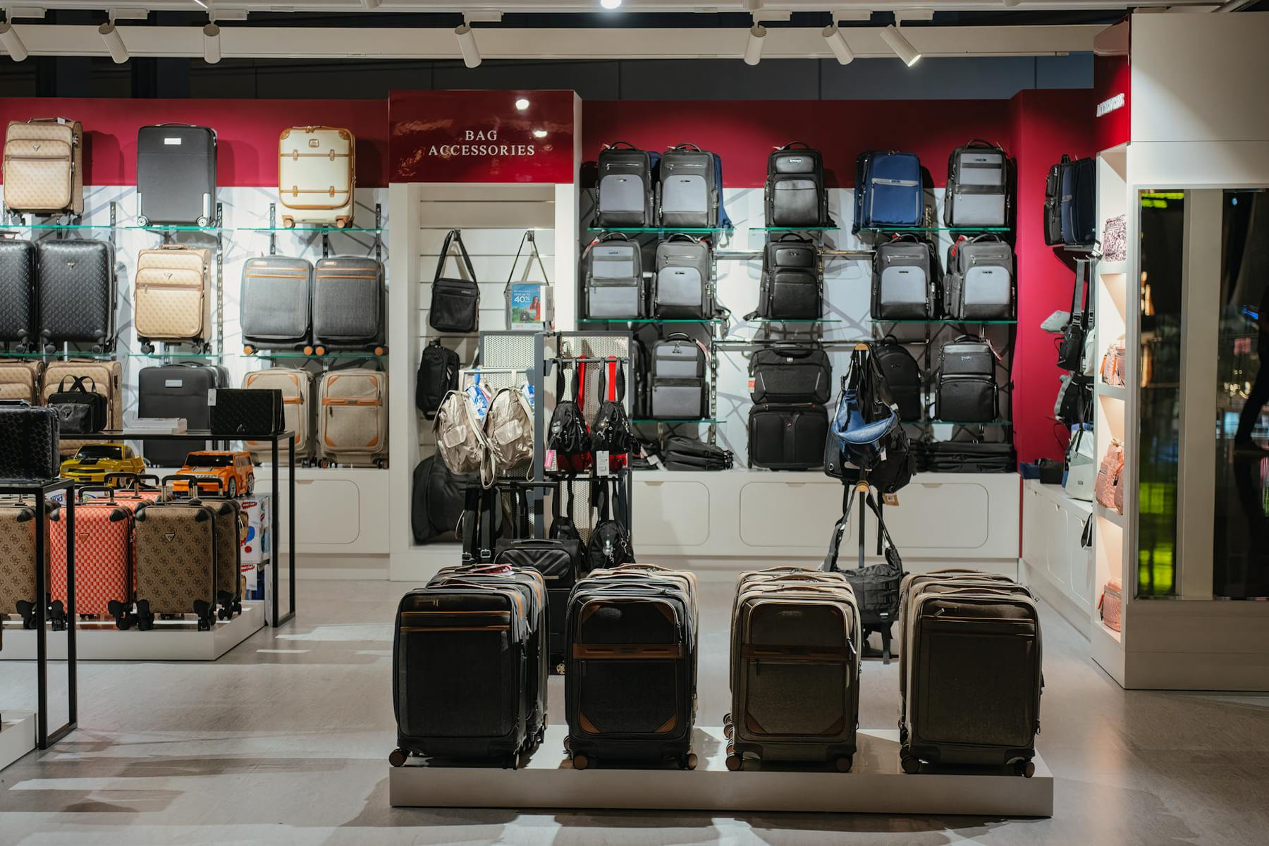 Elegant luggage display in a premium Doha airport shop, Qatar. on Miles and Memories